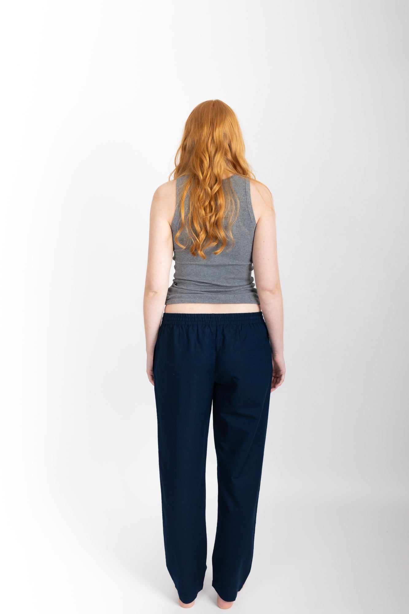 Women’s pyjama pant.  Made from an organic cotton and linen blend, in Navy.  These pants feature an elasticated waistband with a drawstring for comfort.