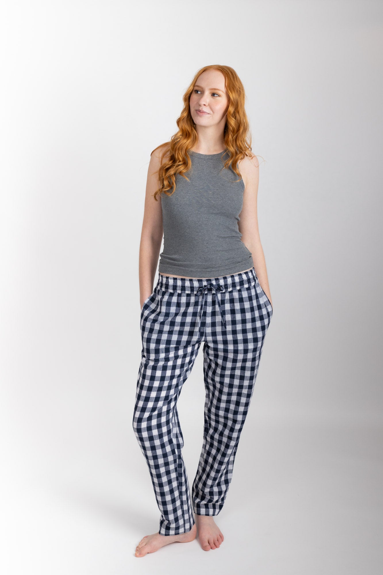 Women’s pyjama pant.  Made from an organic cotton and linen blend, in a Navy check.  These pants feature an elasticated waistband with a drawstring for comfort.