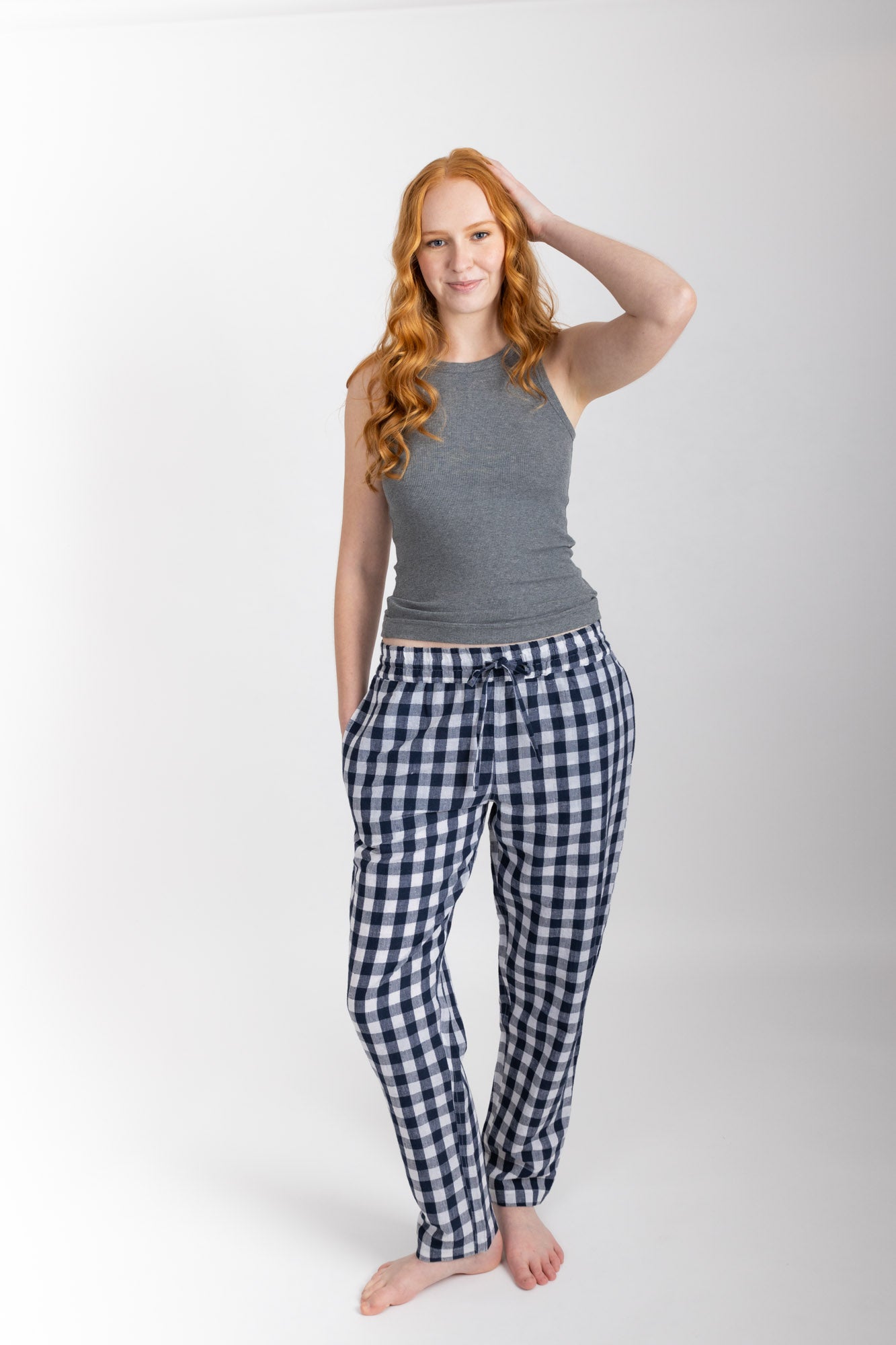 Women’s pyjama pant.  Made from an organic cotton and linen blend, in a Navy check.  These pants feature an elasticated waistband with a drawstring for comfort.