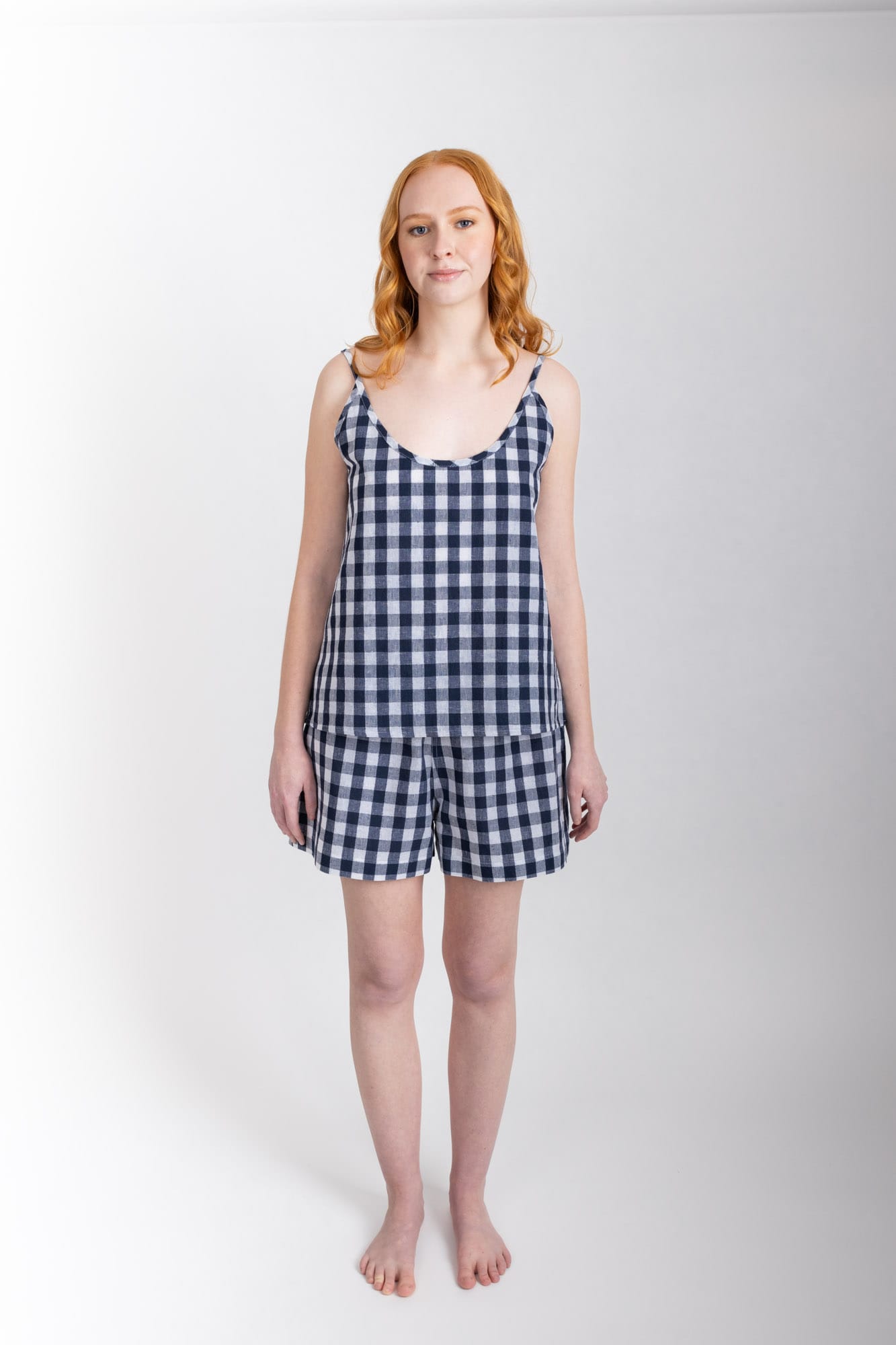 General Sleep Summer Set with a swing-style camisole,  with shorts with elasticated-waistband  and drawstring detail. 55% organic cotton and 45% linen blend, in a Navy Check.  